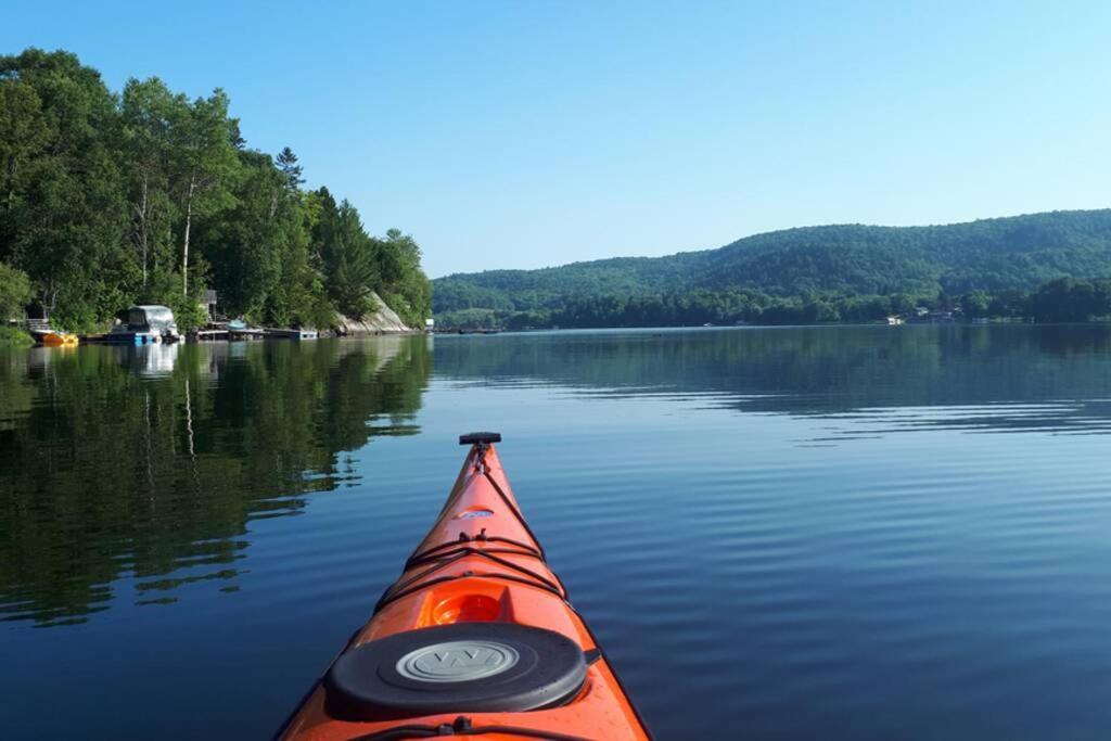 Le Nid doré sur le lac  Val des Monts Esterno foto